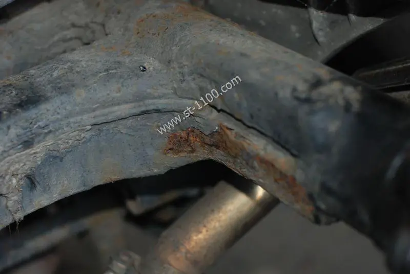 Rusty motorcycle rear swingarm